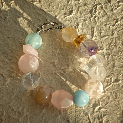 Soft mint, cotton-candy pink, crystal clear, lemon sorbet, and lavender fuse in this crystal bracelet.