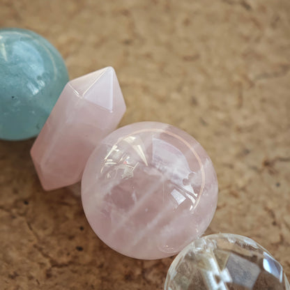 A gentle gradient of aquamarine, rose quartz, clear quartz, citrine, and amethyst evokes macaron dreams.