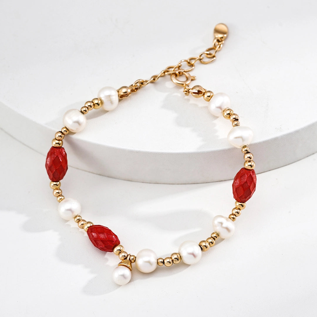 This is a bracelet consist of genuine 925 silver, luminous 5-6mm freshwater pearls, and striking cinnabar. The bracelet measures 16cm with a 3cm extender.