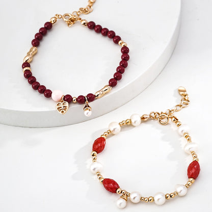 This is a bracelet consist of genuine 925 silver, luminous 5-6mm freshwater pearls, and striking cinnabar. The bracelet measures 16cm with a 3cm extender.