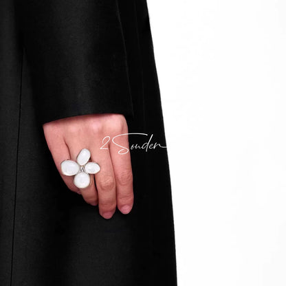 Each piece in this ring and earring set is meticulously crafted from natural mother-of-pearl, showcasing its naturally radiant luster. The large floral design is the main feature of the ring, with rich, vintage-inspired colors and unique natural textures, making each piece one-of-a-kind.