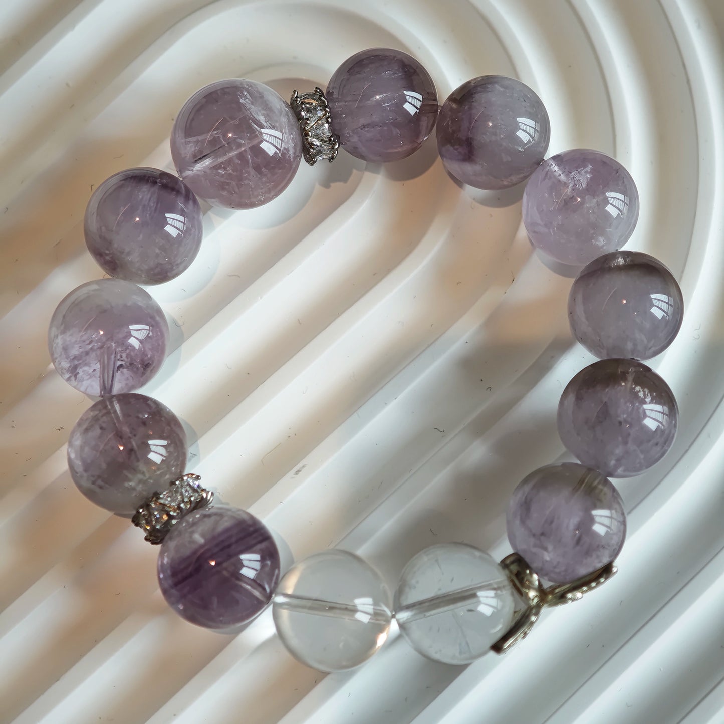 This is an artisan Purple Rabbit Hair Crystal Healing Bracelet, which is handmade with Lavender Amethyst, Clear Quartz & Butterfly Charm.
