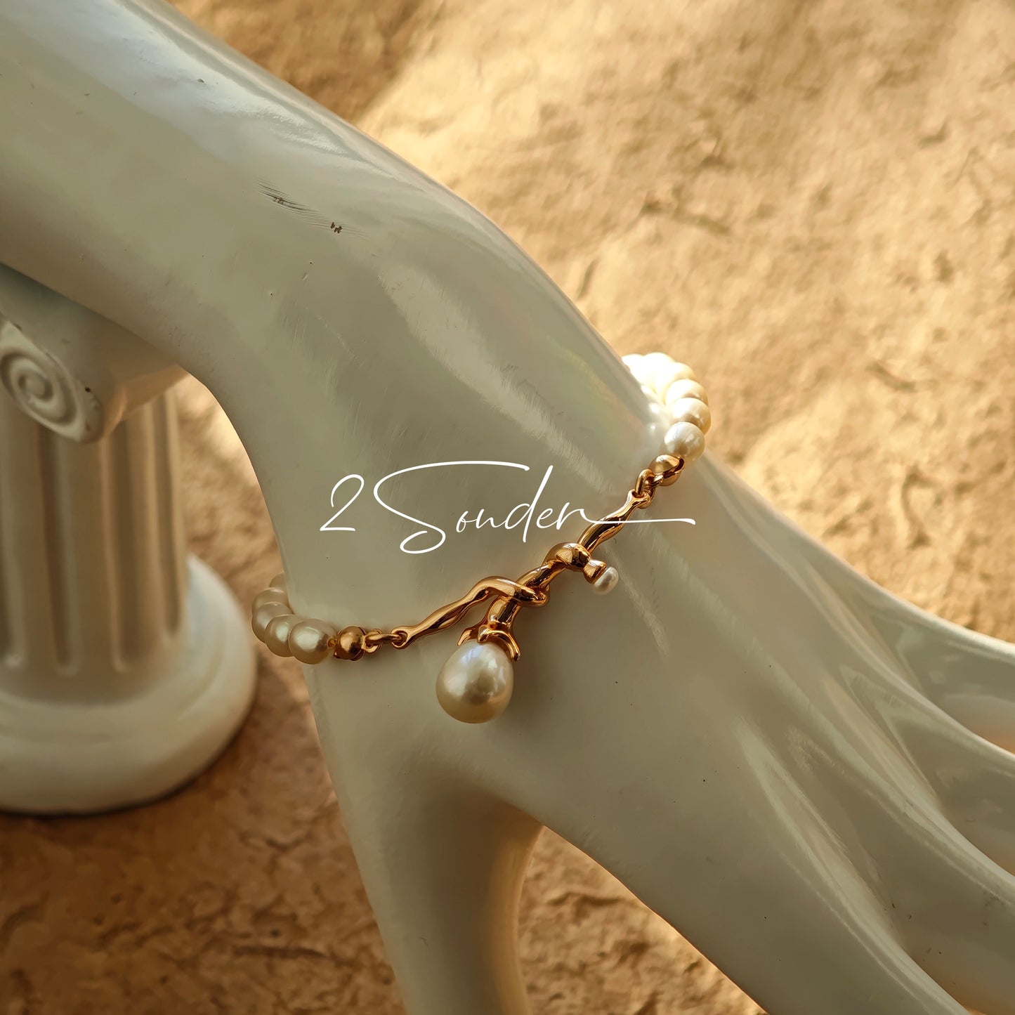 This bracelet is inspired by the romantic concept of "intertwined destiny," the vintage gold color sterling silver gently wraps together like vines. The end of the vines are plated lustrous Freshwater Pearls, symbolizing the beautiful bonds of life.