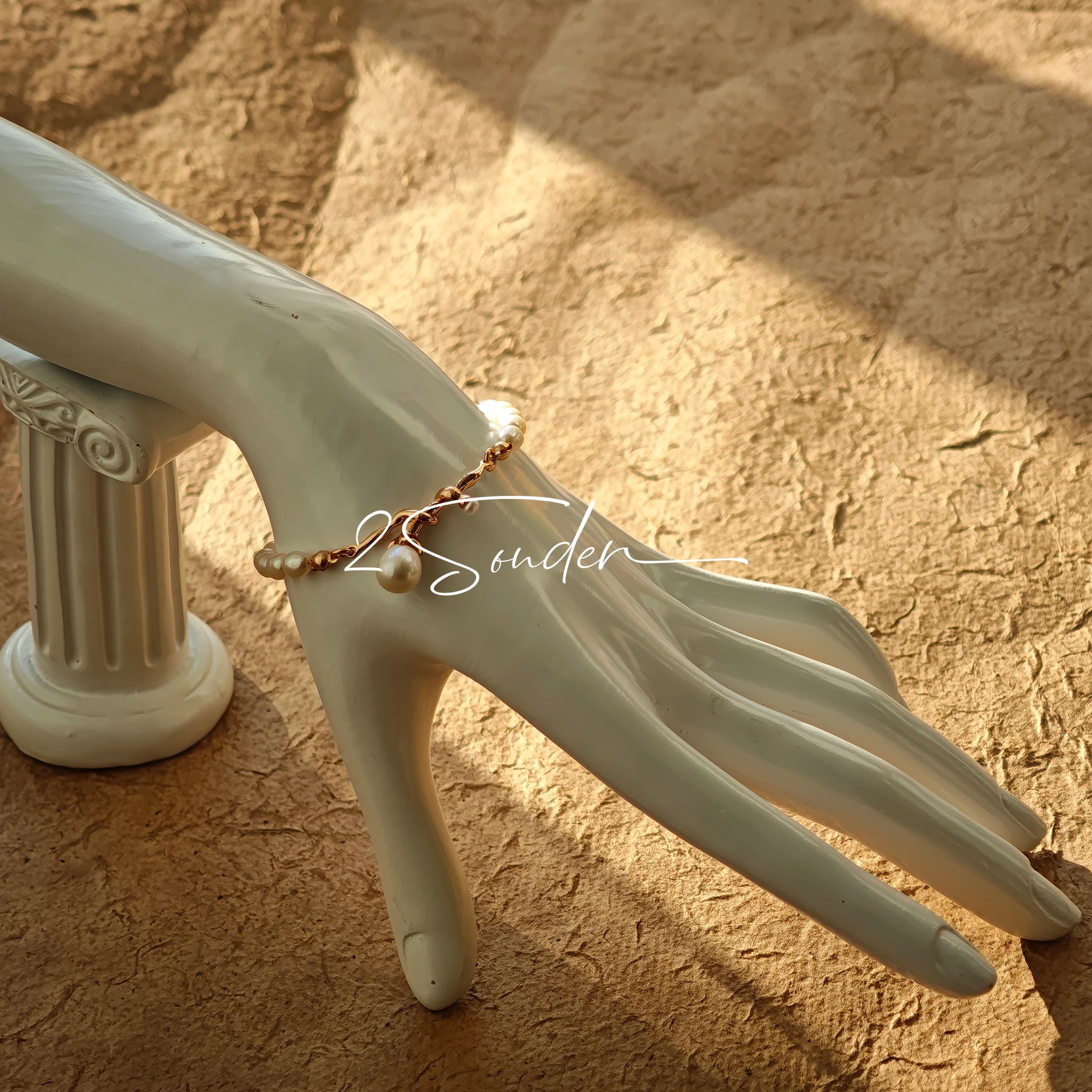 This bracelet is inspired by the romantic concept of "intertwined destiny," the vintage gold color sterling silver gently wraps together like vines. The end of the vines are plated lustrous Freshwater Pearls, symbolizing the beautiful bonds of life.