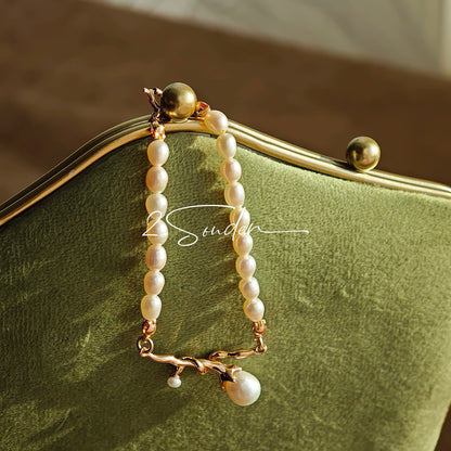 This bracelet is inspired by the romantic concept of "intertwined destiny," the vintage gold color sterling silver gently wraps together like vines. The end of the vines are plated lustrous Freshwater Pearls, symbolizing the beautiful bonds of life.