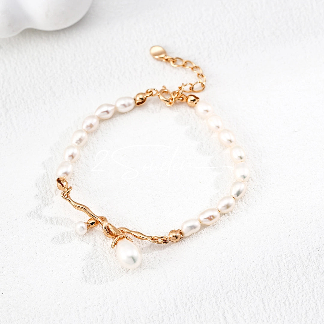 This bracelet is inspired by the romantic concept of "intertwined destiny," the vintage gold color sterling silver gently wraps together like vines. The end of the vines are plated lustrous Freshwater Pearls, symbolizing the beautiful bonds of life.