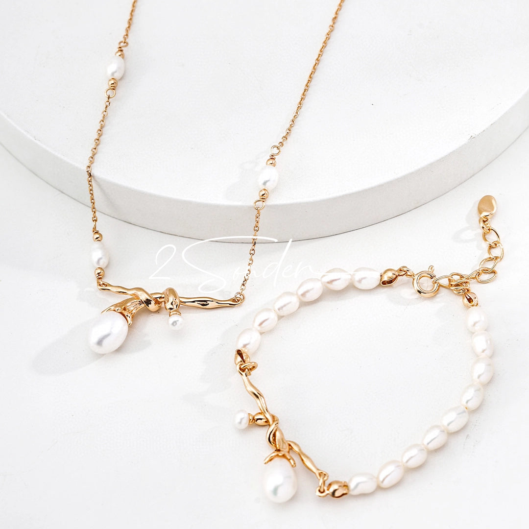 This bracelet is inspired by the romantic concept of "intertwined destiny," the vintage gold color sterling silver gently wraps together like vines. The end of the vines are plated lustrous Freshwater Pearls, symbolizing the beautiful bonds of life.