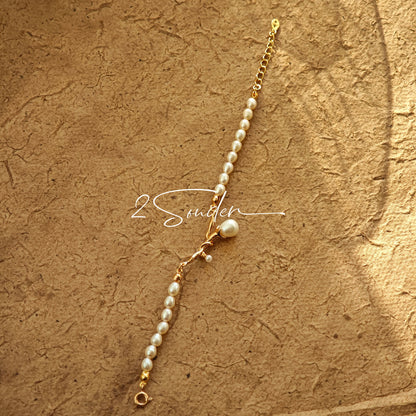 This bracelet is inspired by the romantic concept of "intertwined destiny," the vintage gold color sterling silver gently wraps together like vines. The end of the vines are plated lustrous Freshwater Pearls, symbolizing the beautiful bonds of life.