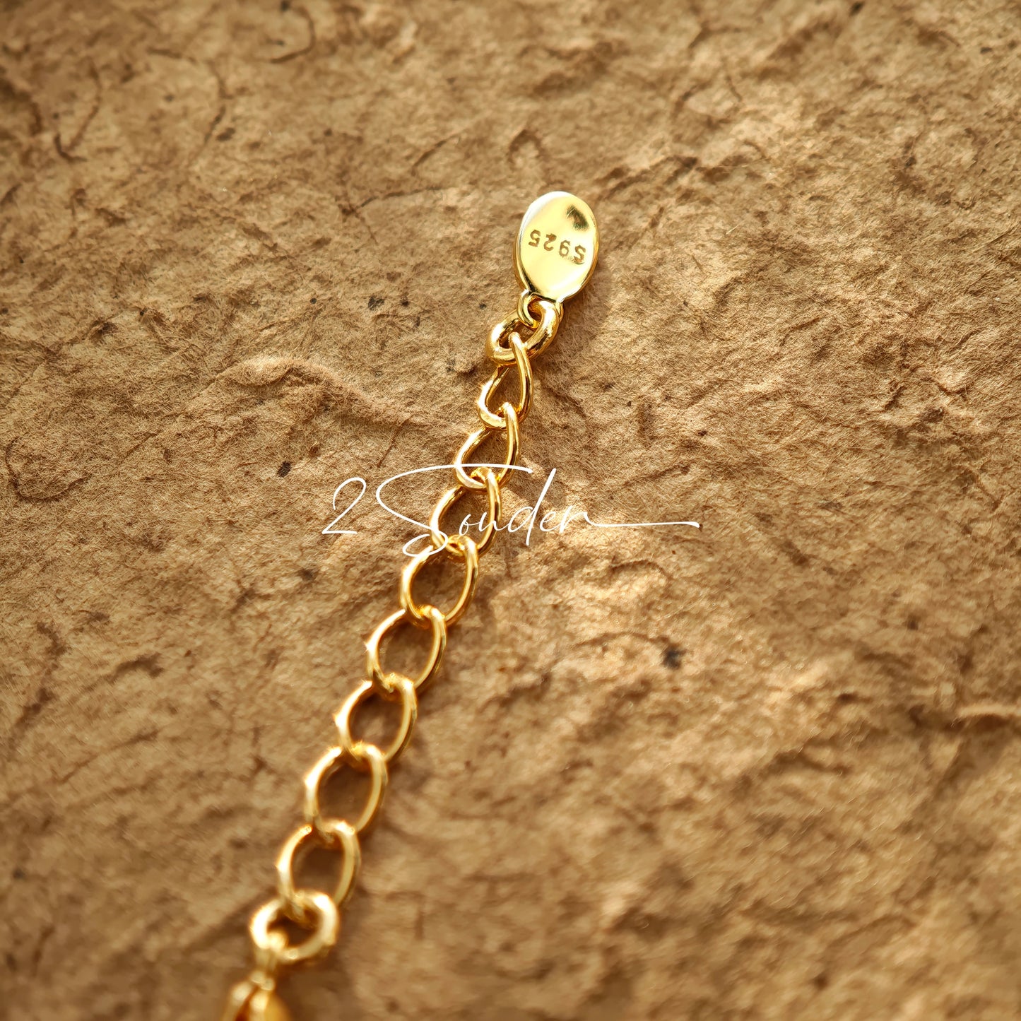 This bracelet is inspired by the romantic concept of "intertwined destiny," the vintage gold color sterling silver gently wraps together like vines. The end of the vines are plated lustrous Freshwater Pearls, symbolizing the beautiful bonds of life.