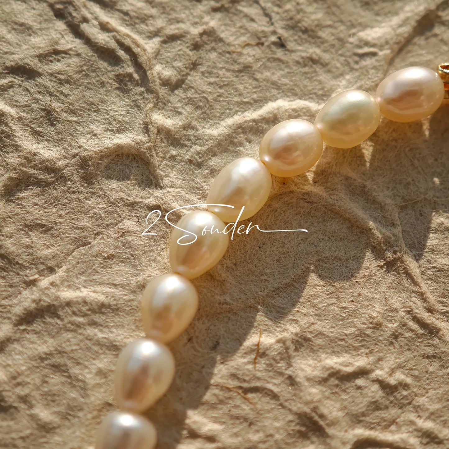 This bracelet is inspired by the romantic concept of "intertwined destiny," the vintage gold color sterling silver gently wraps together like vines. The end of the vines are plated lustrous Freshwater Pearls, symbolizing the beautiful bonds of life.