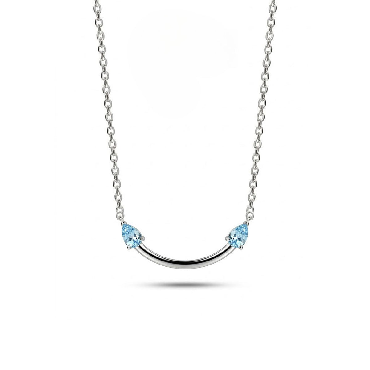 Crafted from polished S925 Sterling Silver, this necklace features a delicate 2.4cm curved bar pendant adorned with shimmering Blue Zircons to mimic a gentle, confident smile. The minimalist design is suspended on an adjustable 40cm clavicle chain, offering a mirror-like finish and a sophisticated touch of quiet luxury.