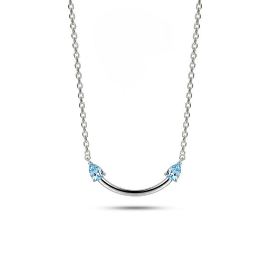 Crafted from polished S925 Sterling Silver, this necklace features a delicate 2.4cm curved bar pendant adorned with shimmering Blue Zircons to mimic a gentle, confident smile. The minimalist design is suspended on an adjustable 40cm clavicle chain, offering a mirror-like finish and a sophisticated touch of quiet luxury.