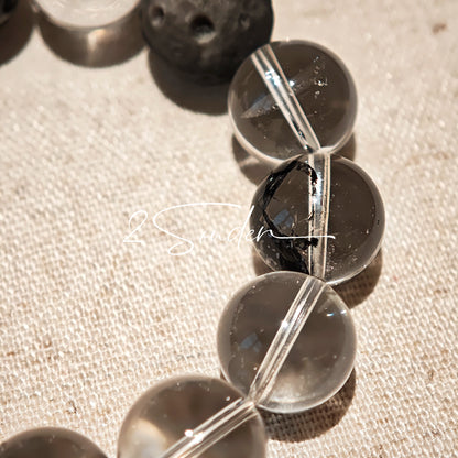 This is a bracelet consists of silver sheen obsidian, clear quartz, herkimer diamonds, meteorite and edgy accents.