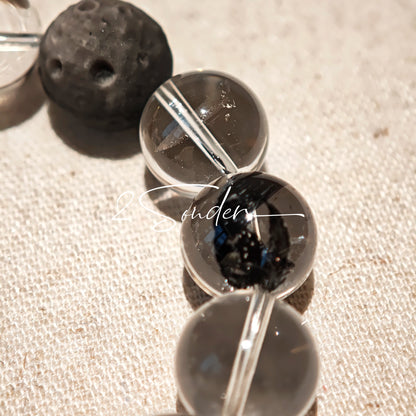 This is a bracelet consists of silver sheen obsidian, clear quartz, herkimer diamonds, meteorite and edgy accents.