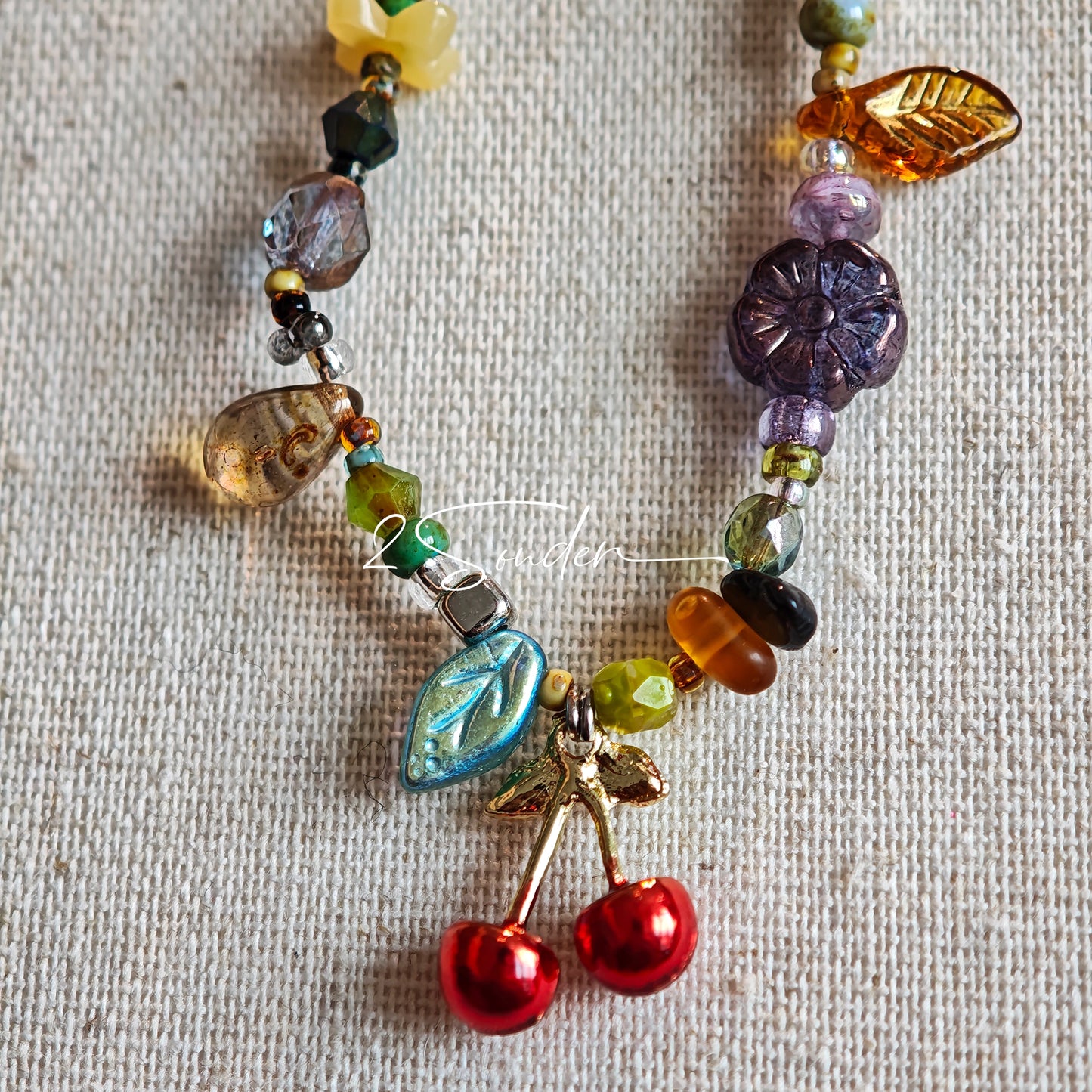 Handmade with vibrant Czech glass beads, this dazzling bag charm can be a phone strap, keychain accessory, or even a chic car decoration - perfect for adding a pop of joy to anything you own.