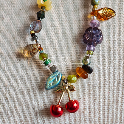 Handmade with vibrant Czech glass beads, this dazzling bag charm can be a phone strap, keychain accessory, or even a chic car decoration - perfect for adding a pop of joy to anything you own.