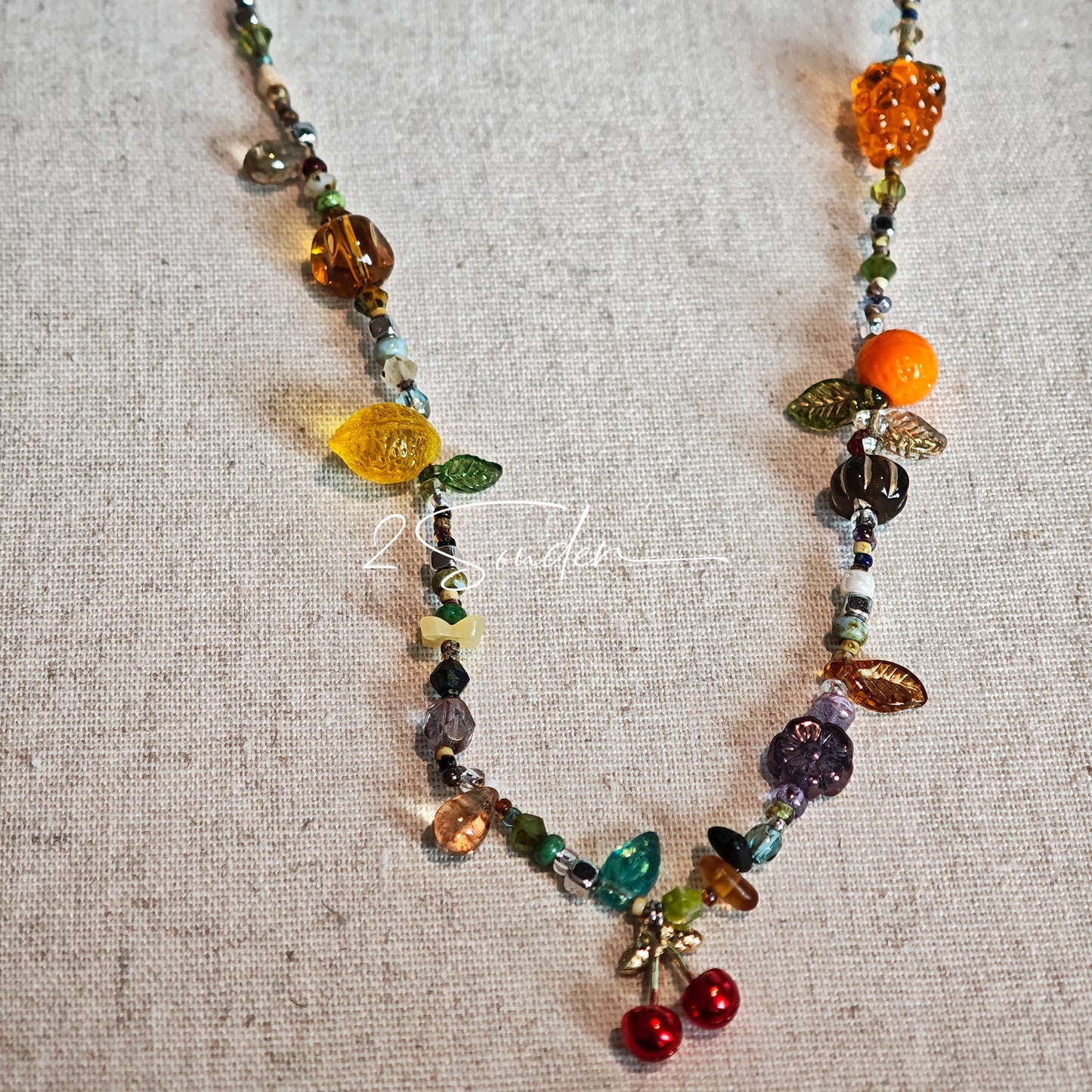 Handmade with vibrant Czech glass beads, this dazzling bag charm can be a phone strap, keychain accessory, or even a chic car decoration - perfect for adding a pop of joy to anything you own.