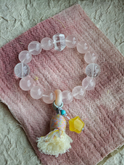 Soft romance meets mystic blue, finished by an amber star, agate traveler, and silky tassel for effortless gypsy chic.