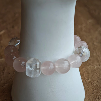 Roseate gems lock arms with sapphire threads, while an amber star, agate bead, and delicate fringe dance at the edges.