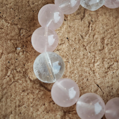 Gentle pink meets celestial blue, and playful charms—amber star, agate slider, airy tassel—elevate the free-spirit vibe.