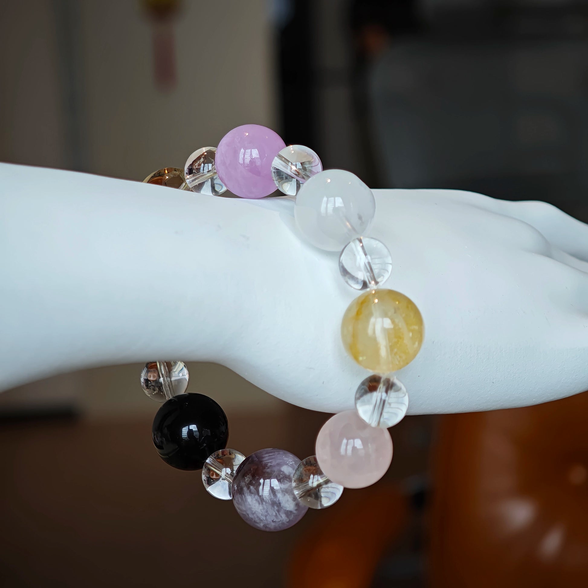 This is a multi-gemstone bracelets consists of Aquamarine, Amethyst, Citrine and White Phantom, etc.