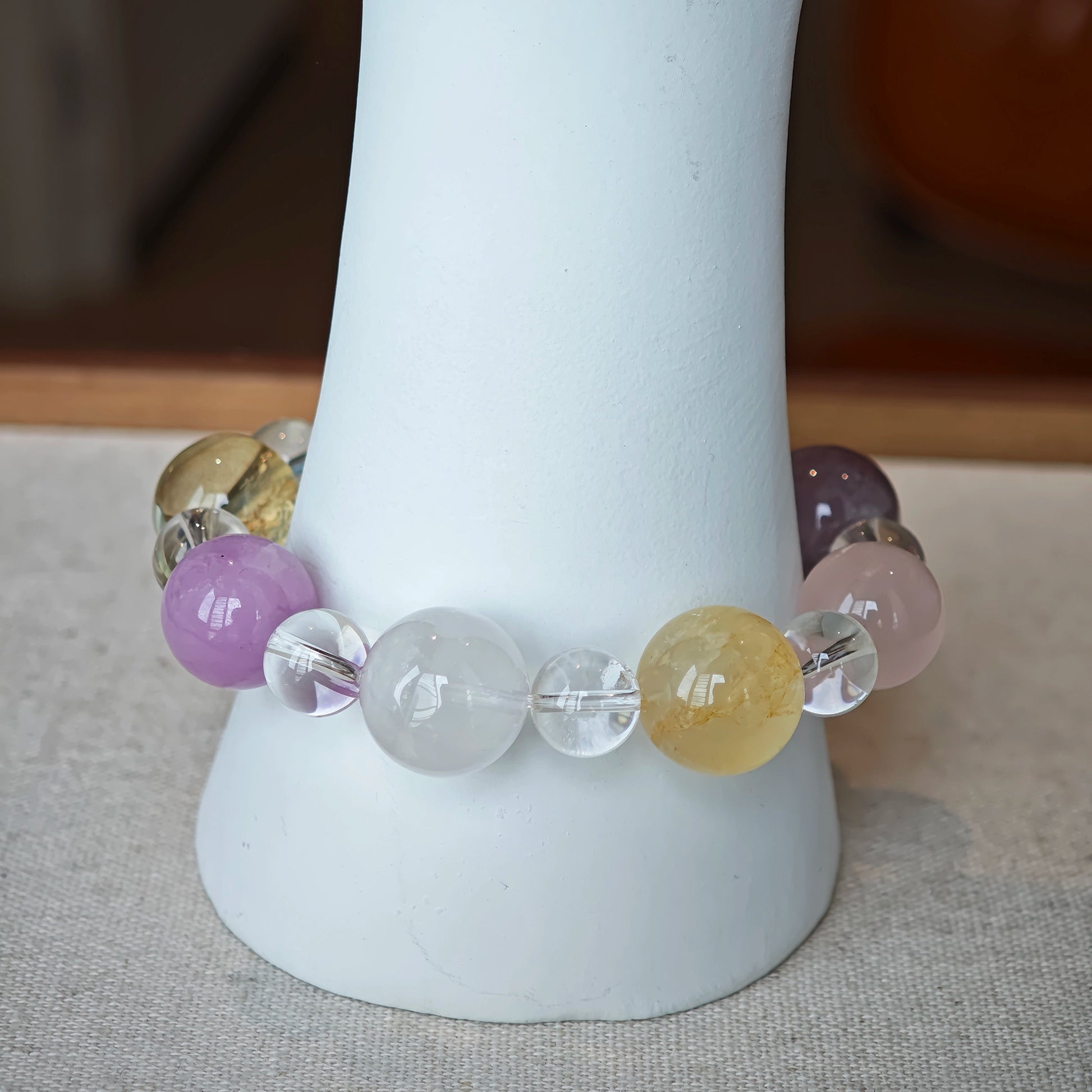 This is a multi-gemstone bracelets consists of Aquamarine, Amethyst, Citrine and White Phantom, etc.