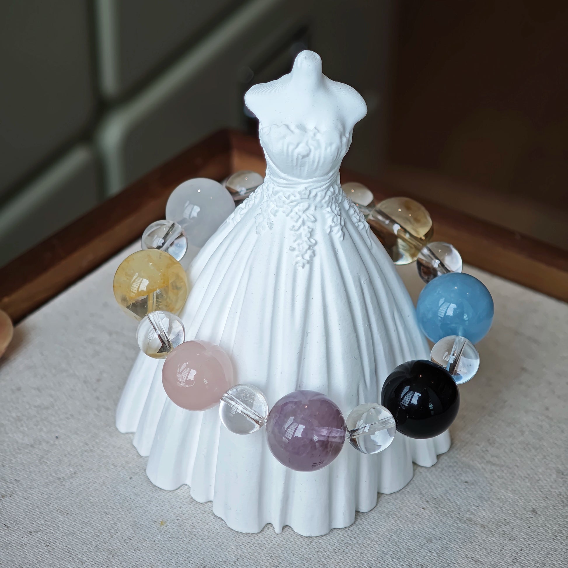 This is a multi-gemstone bracelets consists of Aquamarine, Amethyst, Citrine and White Phantom, etc.