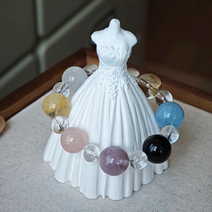 This is a multi-gemstone bracelets consists of Aquamarine, Amethyst, Citrine and White Phantom, etc.