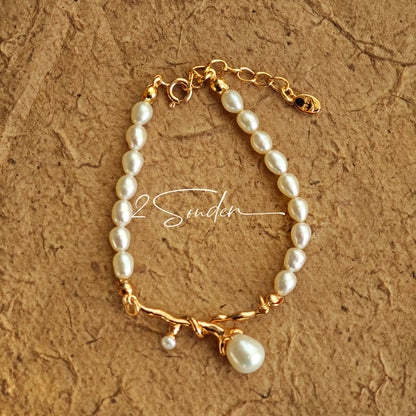 This bracelet is inspired by the romantic concept of "intertwined destiny," the vintage gold color sterling silver gently wraps together like vines. The end of the vines are plated lustrous Freshwater Pearls, symbolizing the beautiful bonds of life.