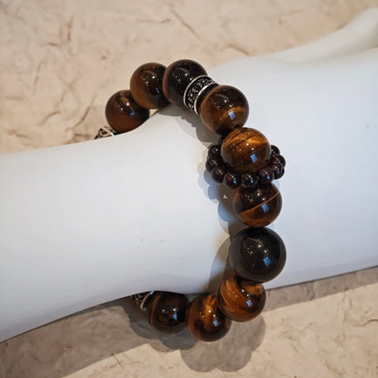 A handmade bracelet with Tiger's Eyes, Silver Sheen Obsidian and Garnet.
