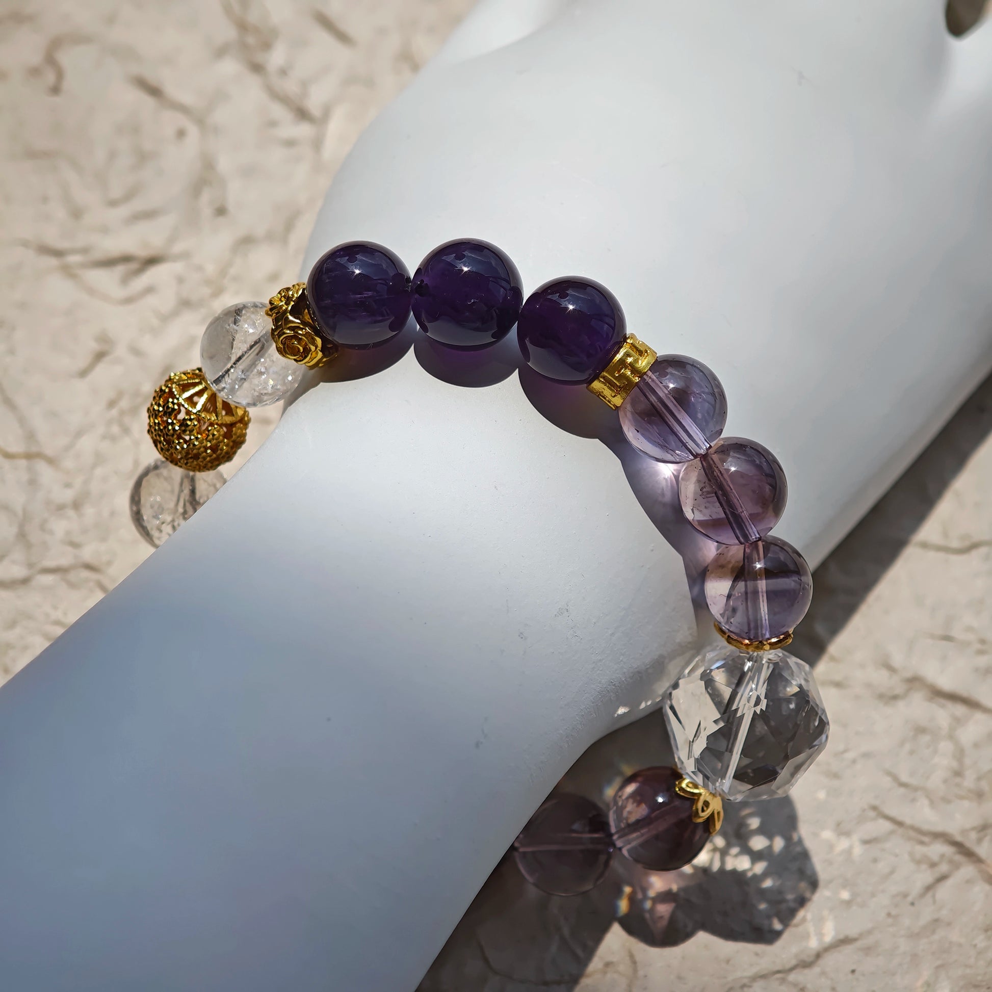 This is a amethyst bracelet consists of Brazilian & Uruguayan amethyst, as well as clear quartz.