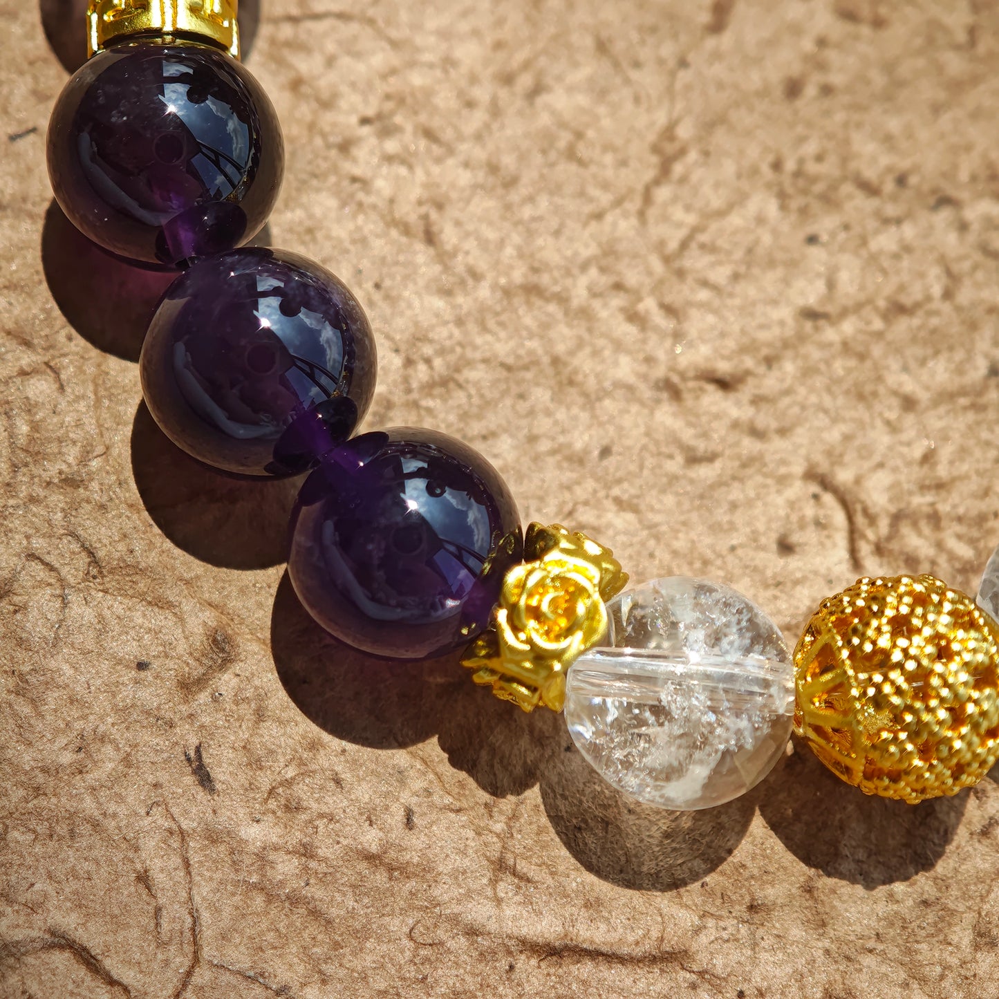 This is a amethyst bracelet consists of Brazilian & Uruguayan amethyst, as well as clear quartz.