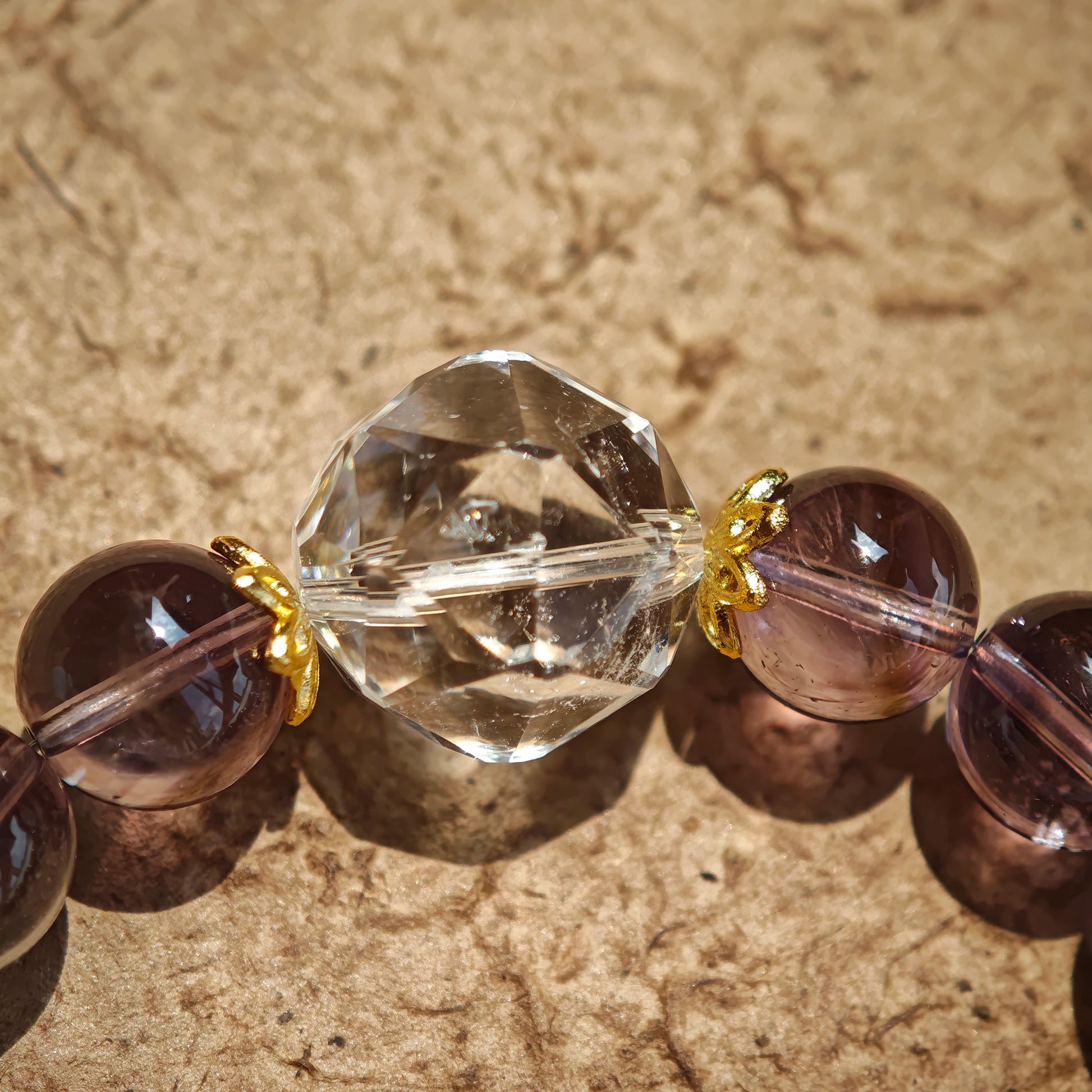 This is a amethyst bracelet consists of Brazilian & Uruguayan amethyst, as well as clear quartz.