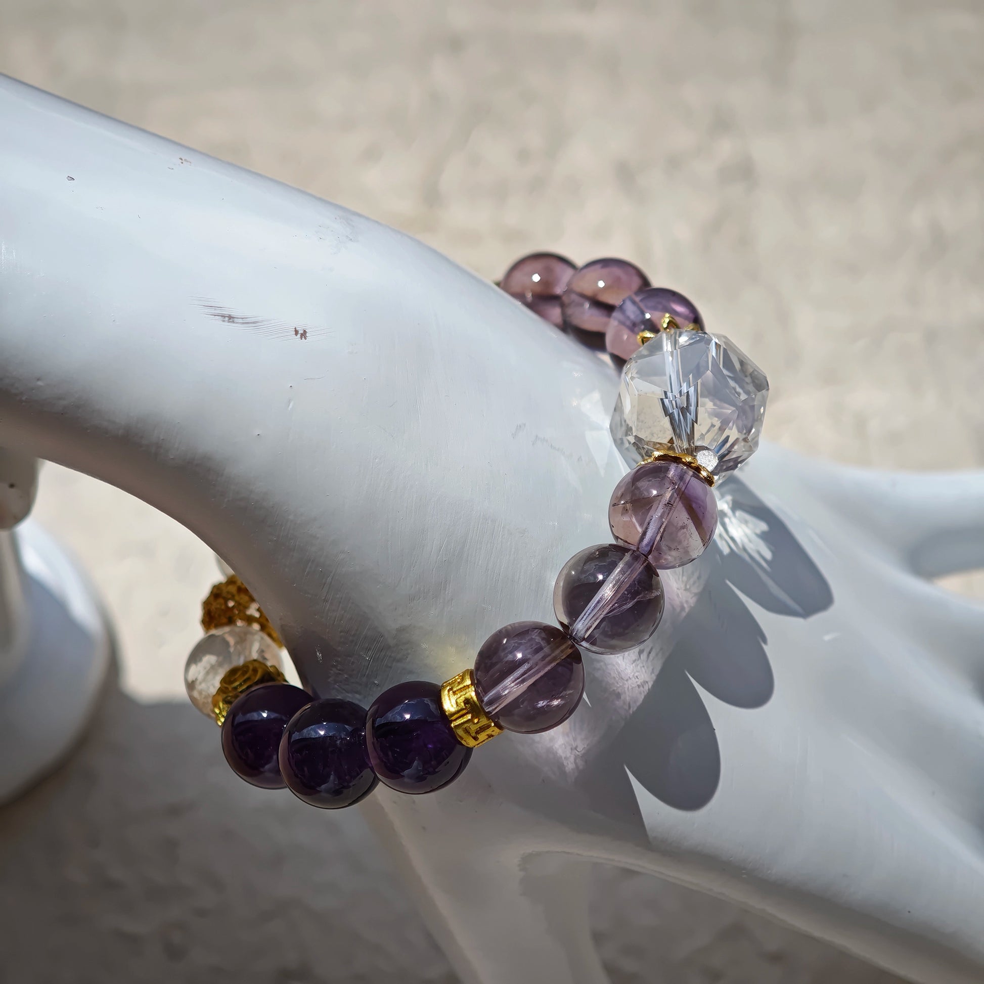 This is a amethyst bracelet consists of Brazilian & Uruguayan amethyst, as well as clear quartz.