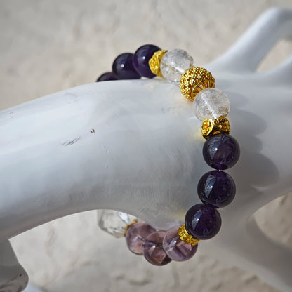 This is a amethyst bracelet consists of Brazilian & Uruguayan amethyst, as well as clear quartz.