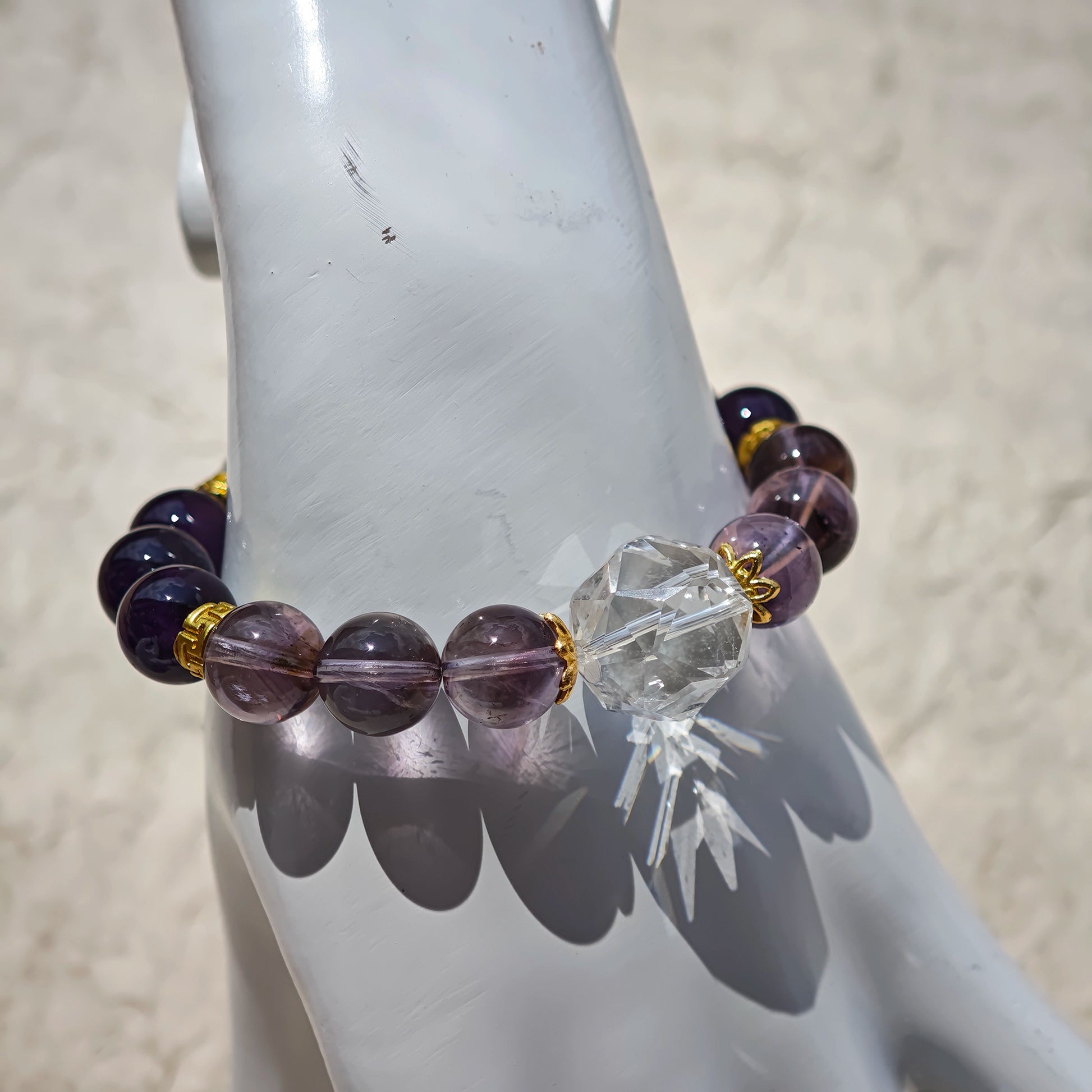 This is a amethyst bracelet consists of Brazilian & Uruguayan amethyst, as well as clear quartz.