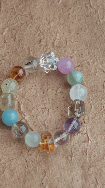 Soft blues, royal purples, warm golds, gentle greens, and misty whites glide like watercolor on silk.