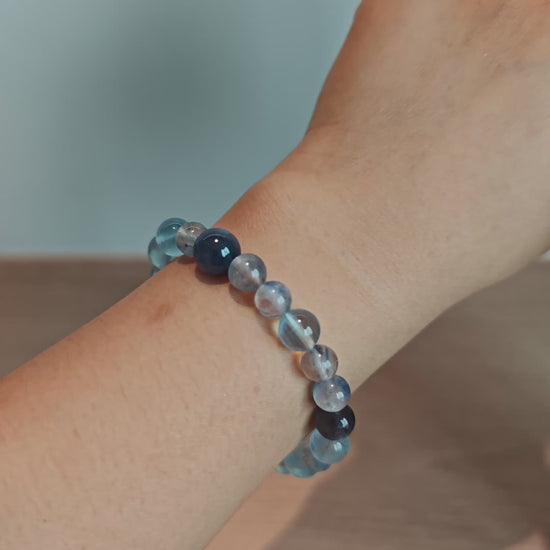 This is a gemstone bracelet consists of Kyanite, Blue Velvet Stone, Aquamarine, and Cordierite.