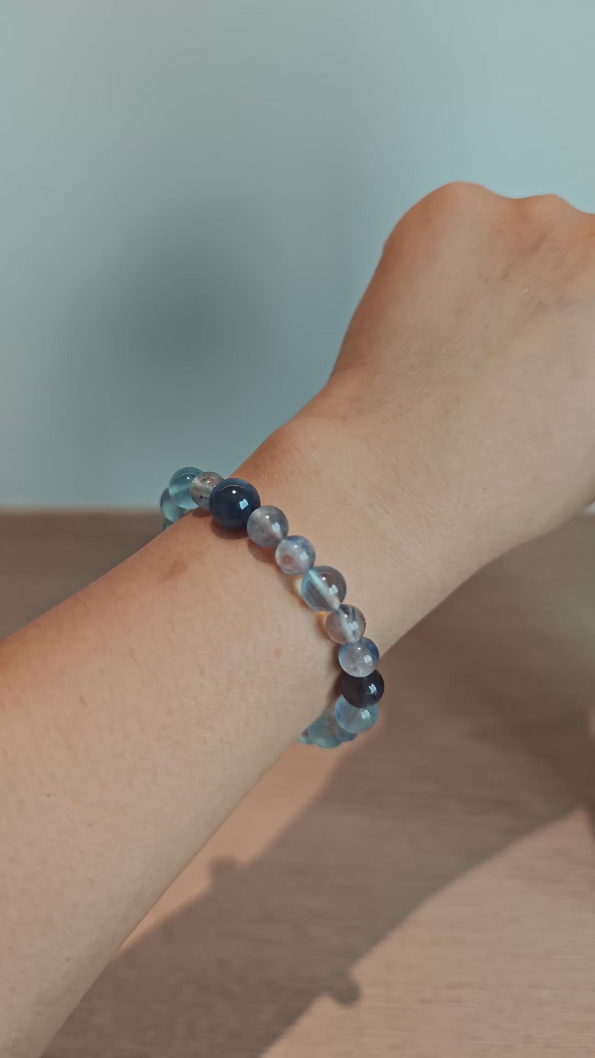 This is a gemstone bracelet consists of Kyanite, Blue Velvet Stone, Aquamarine, and Cordierite.