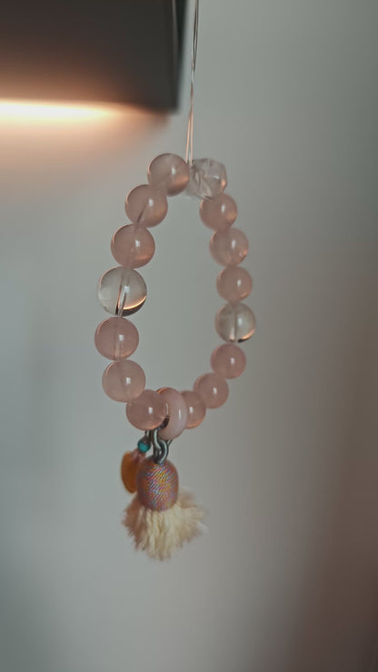 A dreamy blend of pink love and blue wonder, sealed with an amber star, sliding agate bead, and fluttering tassel charm.