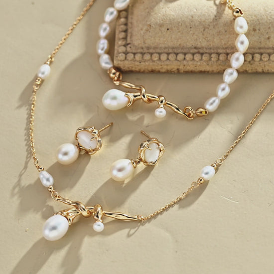 This bracelet is inspired by the romantic concept of "intertwined destiny," the vintage gold color sterling silver gently wraps together like vines. The end of the vines are plated lustrous Freshwater Pearls, symbolizing the beautiful bonds of life.