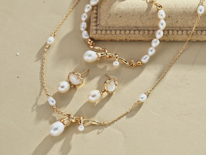 This bracelet is inspired by the romantic concept of "intertwined destiny," the vintage gold color sterling silver gently wraps together like vines. The end of the vines are plated lustrous Freshwater Pearls, symbolizing the beautiful bonds of life.